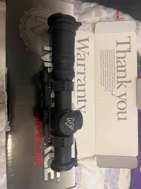 Nightforce 1-8 scope with reptillia mount INCLUDED